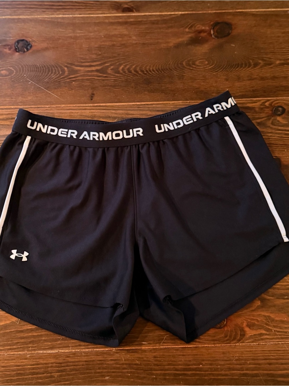 NWOT Under Armour Women's Black Athletic Shorts with White Logo and Trim